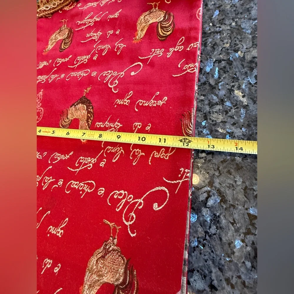 Red jacquard table runner featuring a traditional French rooster design 104x12”